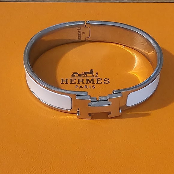 Hermes Jewelry - Hermes Clic H Bracelet in White with Silver Hardware.